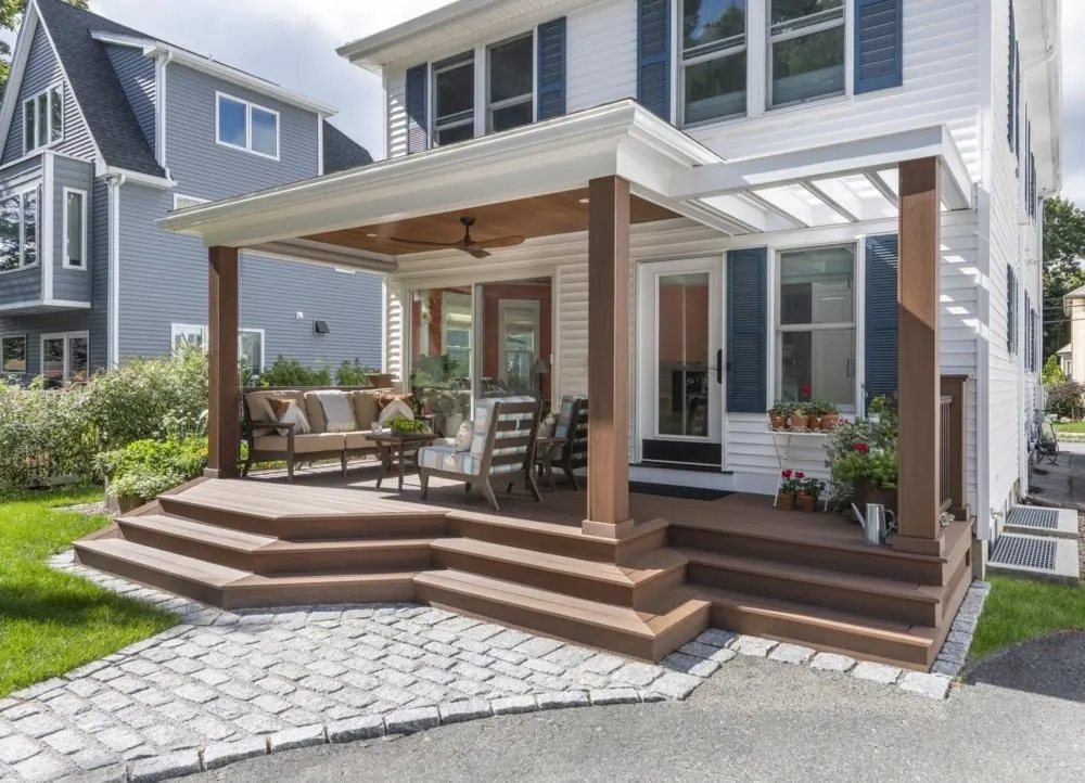 Rear addition and deck creating a seamless indoor-outdoor transition by Lussoro Design + Build