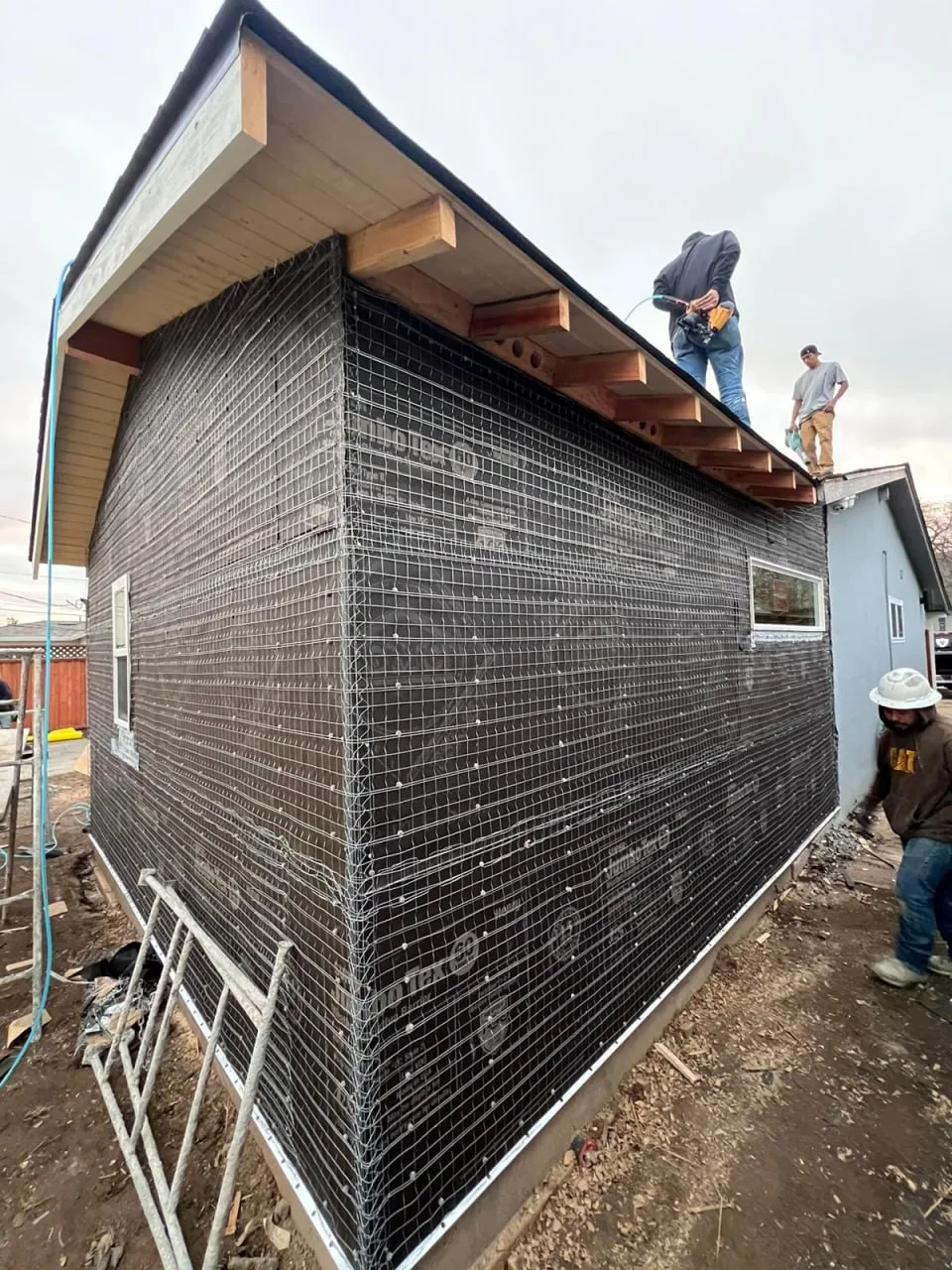 Lussoro construction team working inside a framed Bay Area home